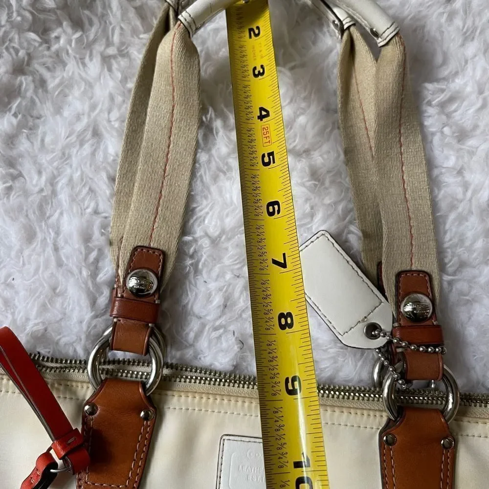 Coach Hampton Beige satin and orange accents satchel with silver tone hardwares